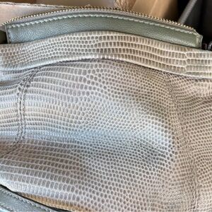 B. Makowsky leather crossbody bag,a gold chain strap and lizard-embossed texture